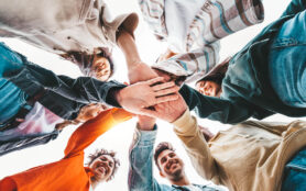 Community,Of,Young,People,Stacking,Hands,Together, ,Multiracial,College